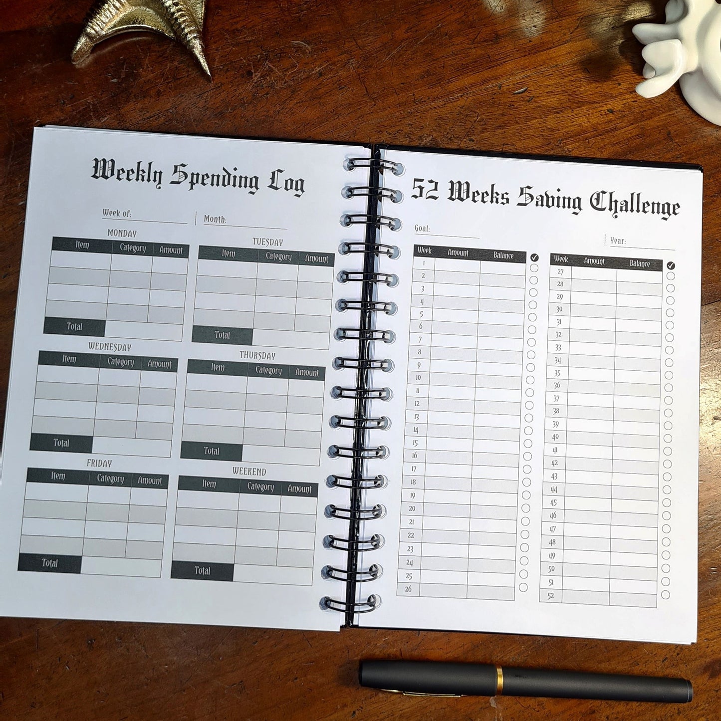 A two-page layout inside the Financial Planner by Gothic Office. The left page is the Weekly Spending Log and the right page is 52 Weeks Saving Challenge.