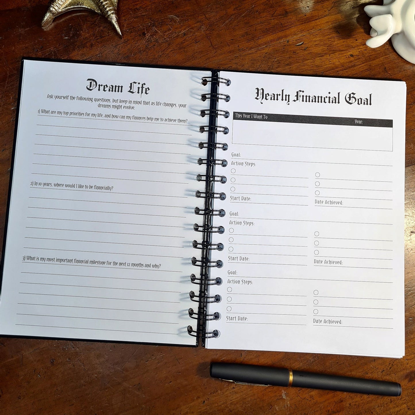 A two-page layout inside the Financial Planner by Gothic Office. The left page is a space to write your Dream Life, and the right is for your Yearly Financial Goals