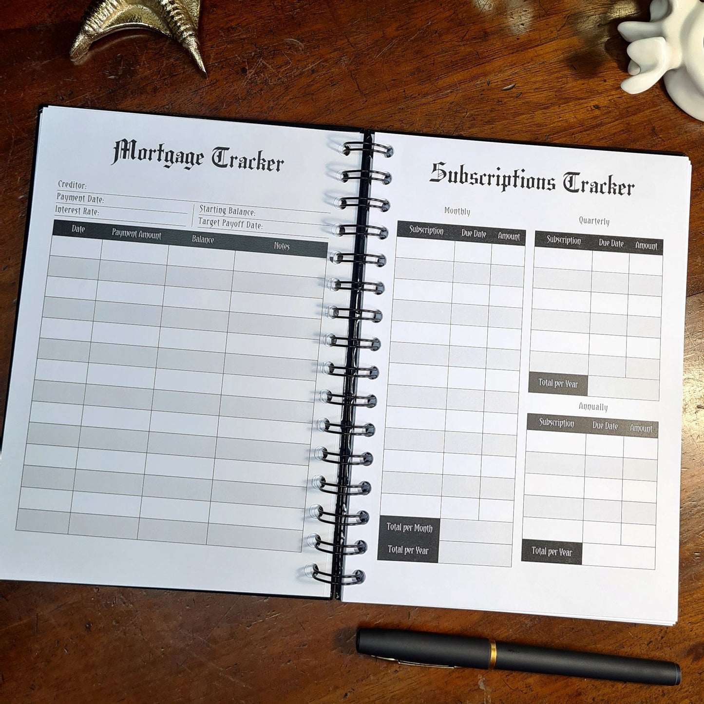 A two-page layout inside the Financial Planner by Gothic Office. The left page is a Mortgage Tracker and the right is a Subscriptions Tracker.