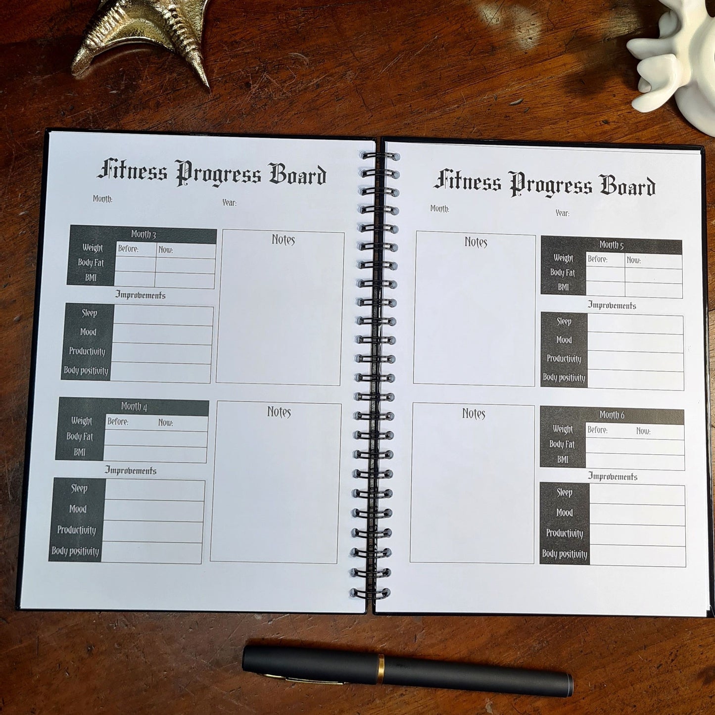 A two page layout inside the Fitness Planner by Gothic Office. Both pages our Fitness Progress Boards.