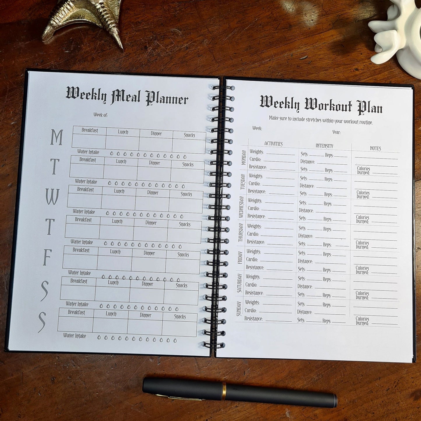 A two page layout inside the Fitness Planner by Gothic Office. The left page is a Weekly Meal Planner and the right is a Weekly Workout Plan.