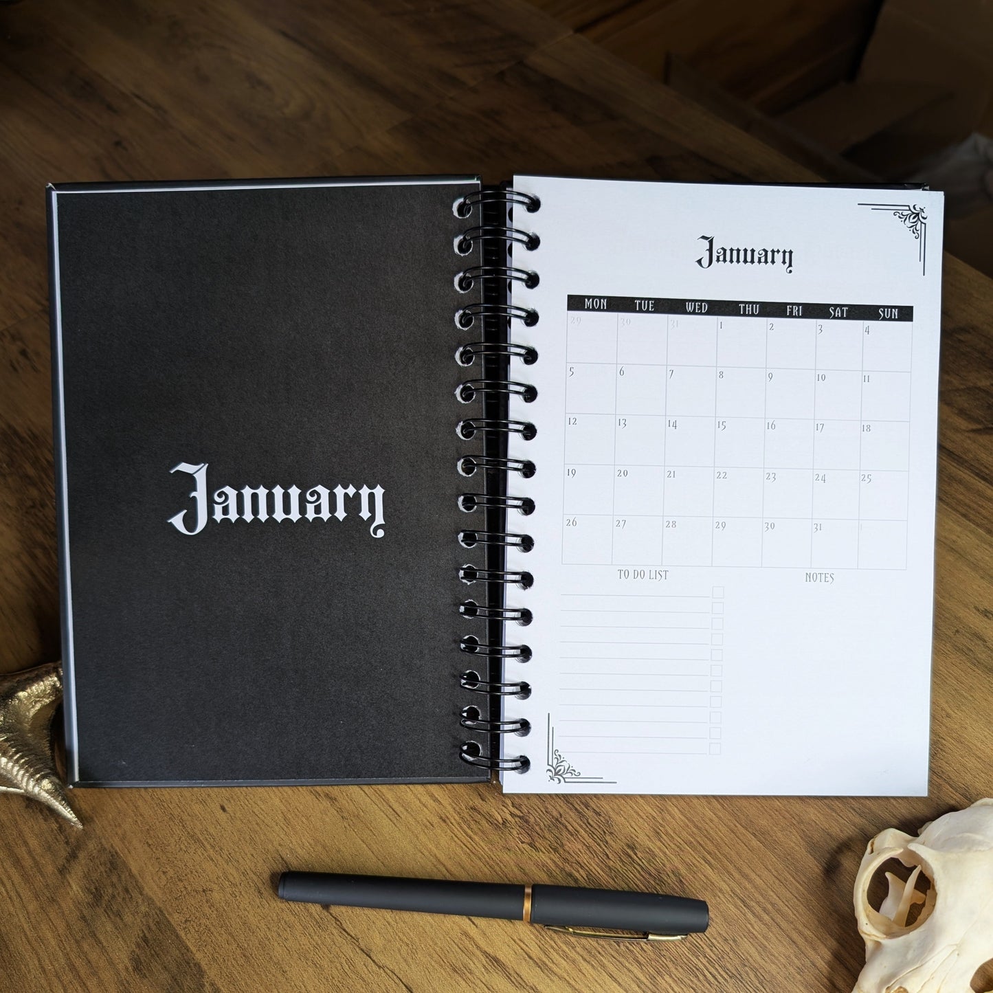 A two page spread of the Gothic Office 2026 Planner showing a monthly table of January, a to do list and notes section.