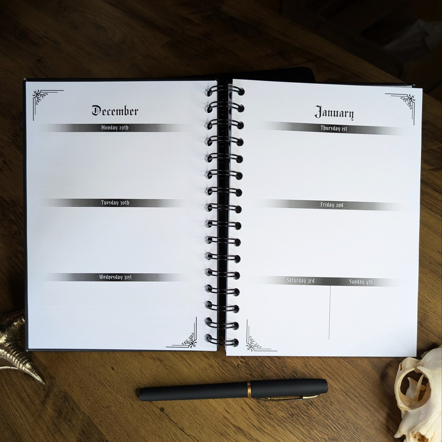 A two page spread in the Gothic Office 2026 Planner which shows the weekly layout.