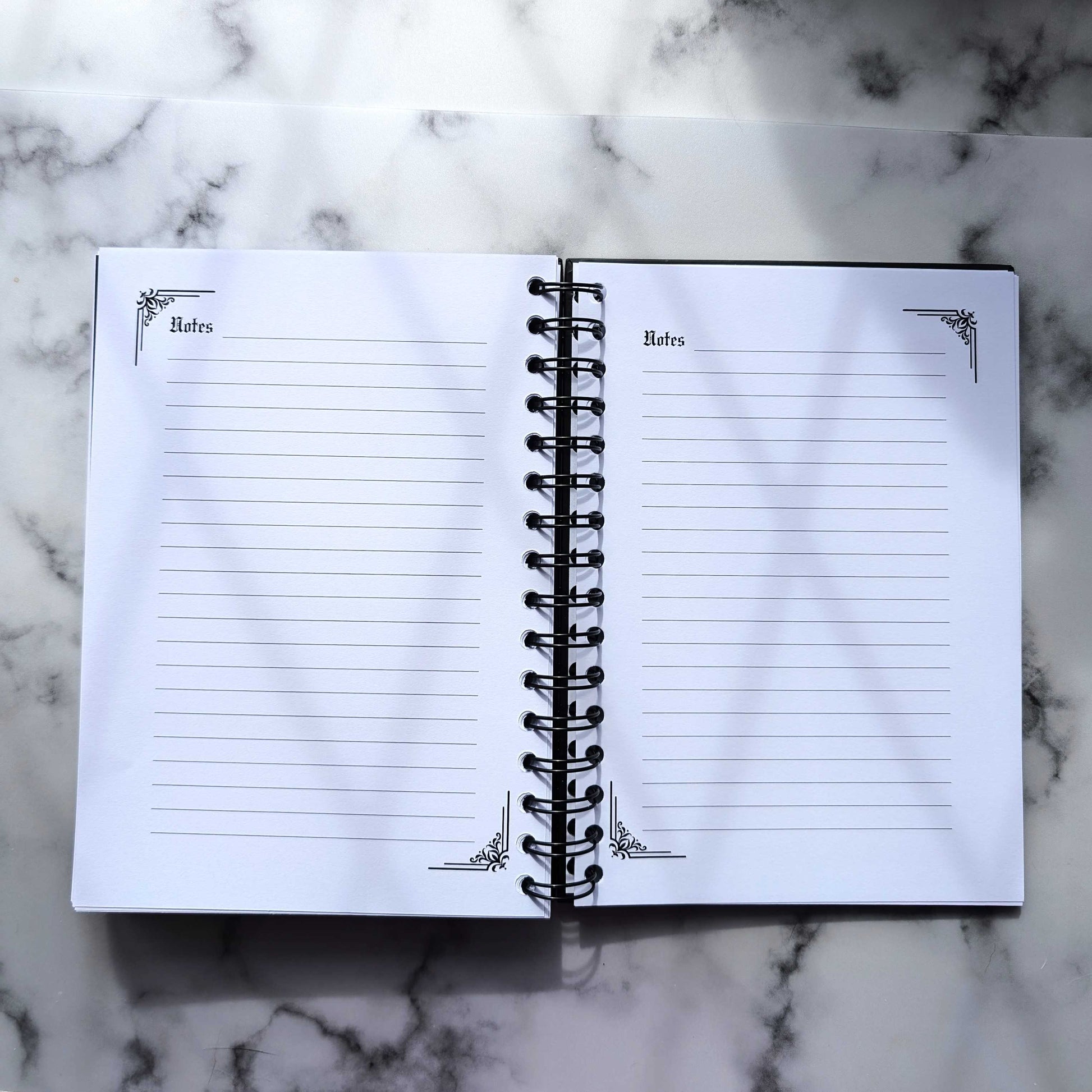 A two page layout inside the 2025 Planner by Gothic Office. These two pages are lined note pages.