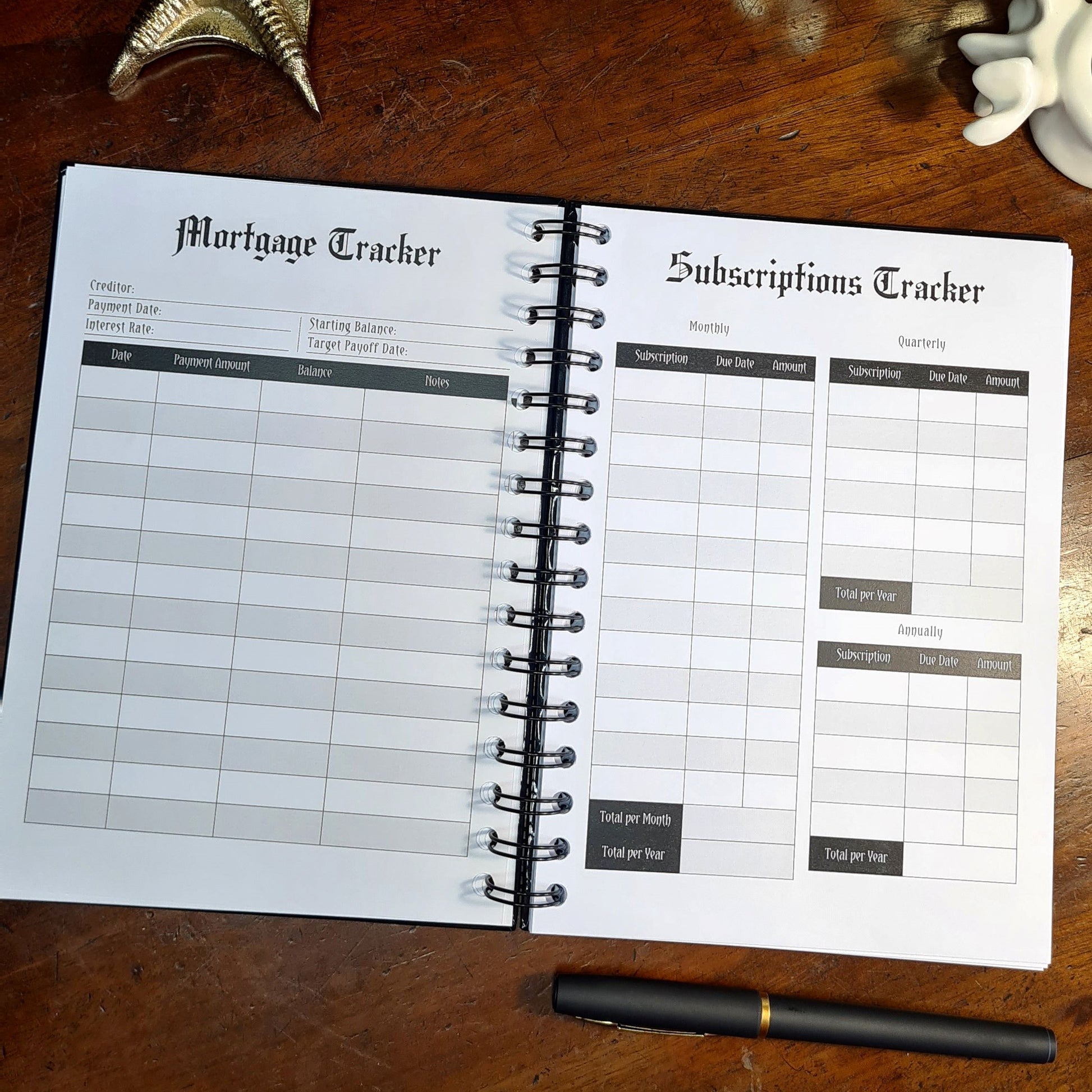 A two-page layout inside the Financial Planner by Gothic Office. The left page is a Mortgage Tracker and the right is a Subscriptions Tracker.