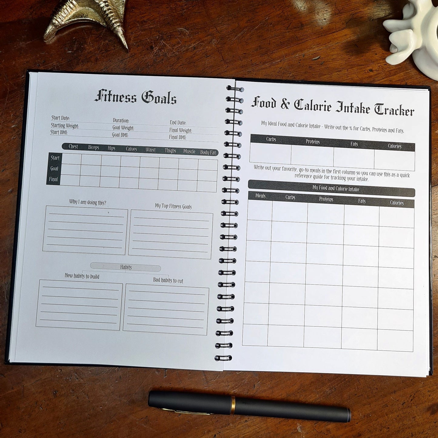 A two page layout inside the Fitness Planner by Gothic Office. The left page is Fitness Goals and the right is Food & Calorie Intake Tracker.