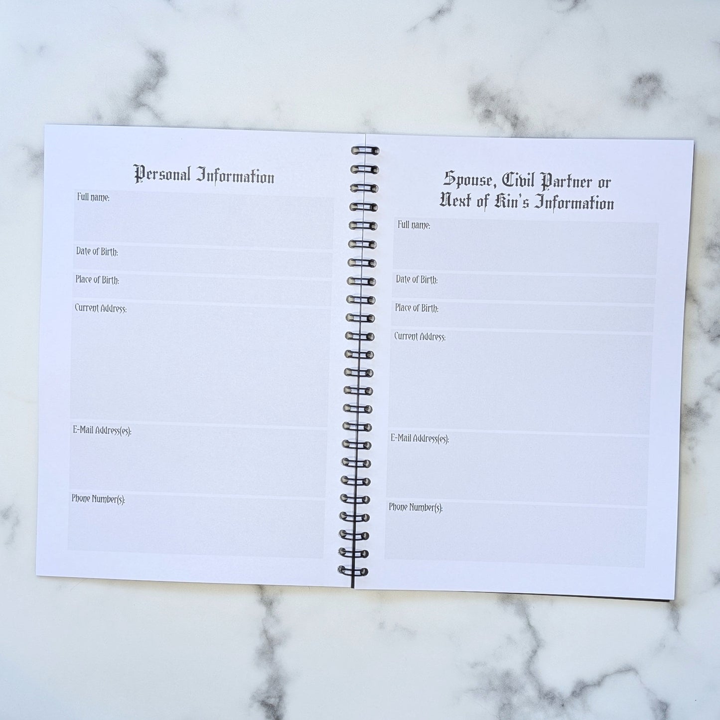 Two page view of the Rest In Peace Planner by Gothic Office.  These pages are for Personal Information and Spouse, Civil Partner or Next of Kin's Information. 