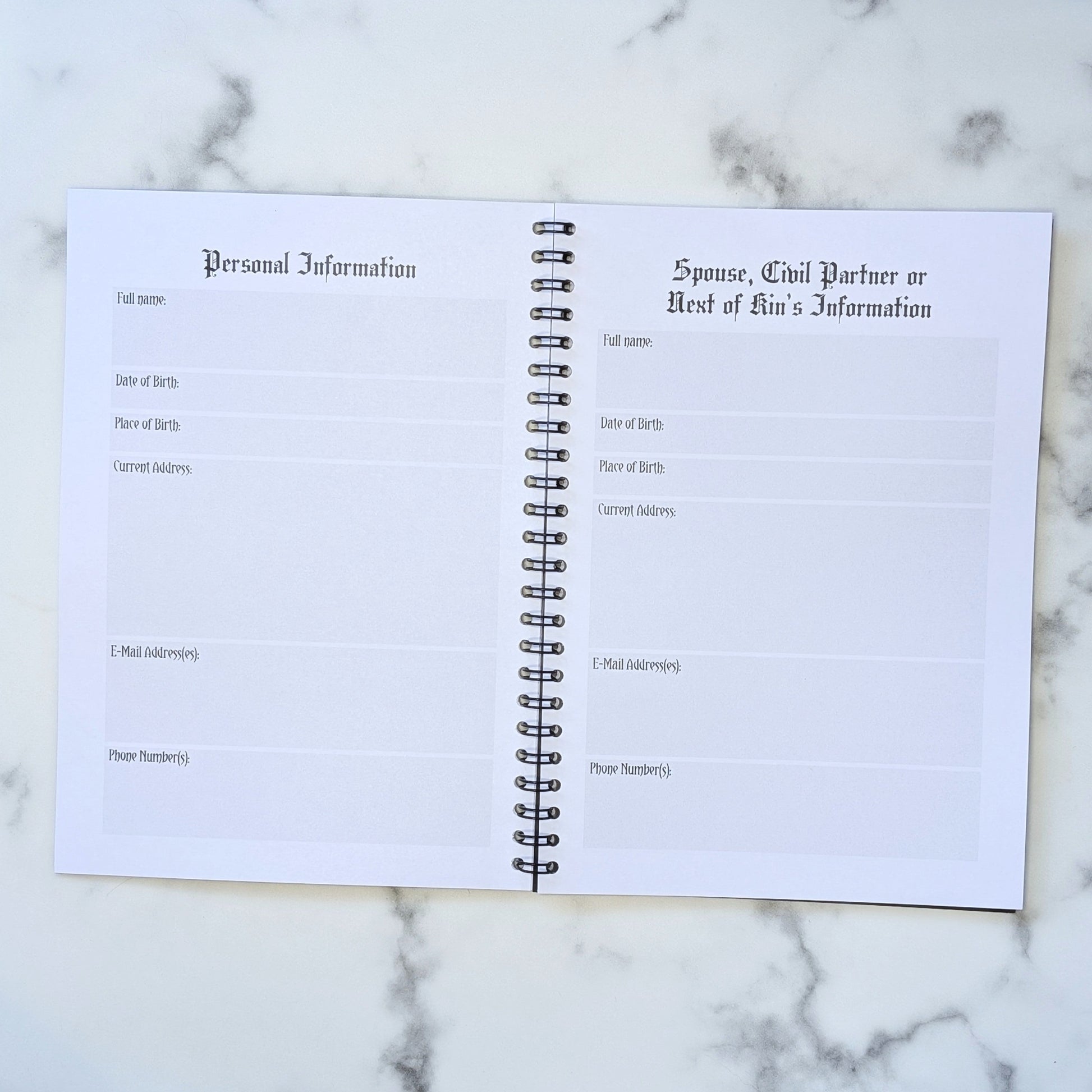 Two page view of the Rest In Peace Planner by Gothic Office.  These pages are for Personal Information and Spouse, Civil Partner or Next of Kin's Information. 