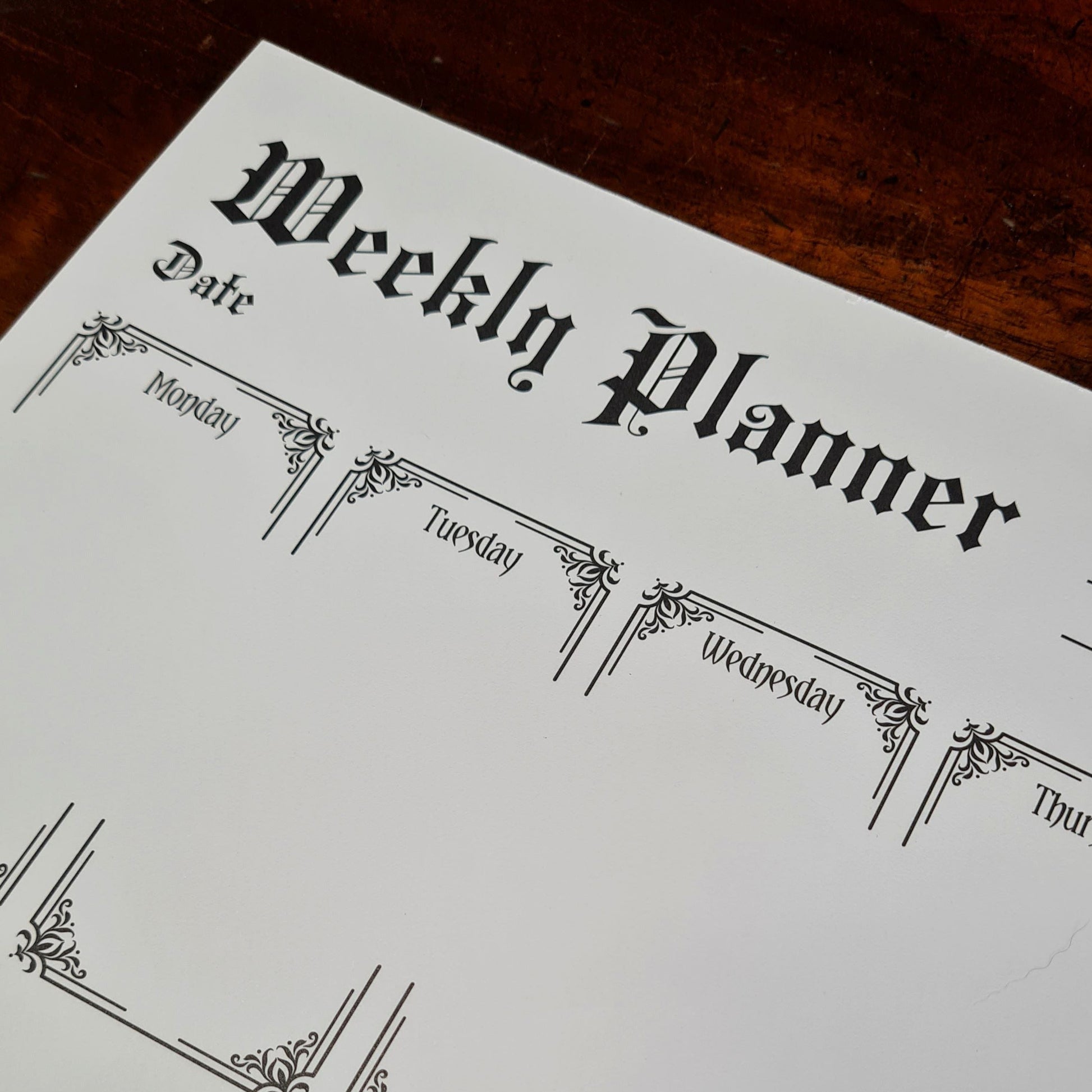 A Weekly Planner Notepad in a Gothic Style. 50 pages with spaces for each day of the week, Notes and Priorities. Product by Gothic Office.