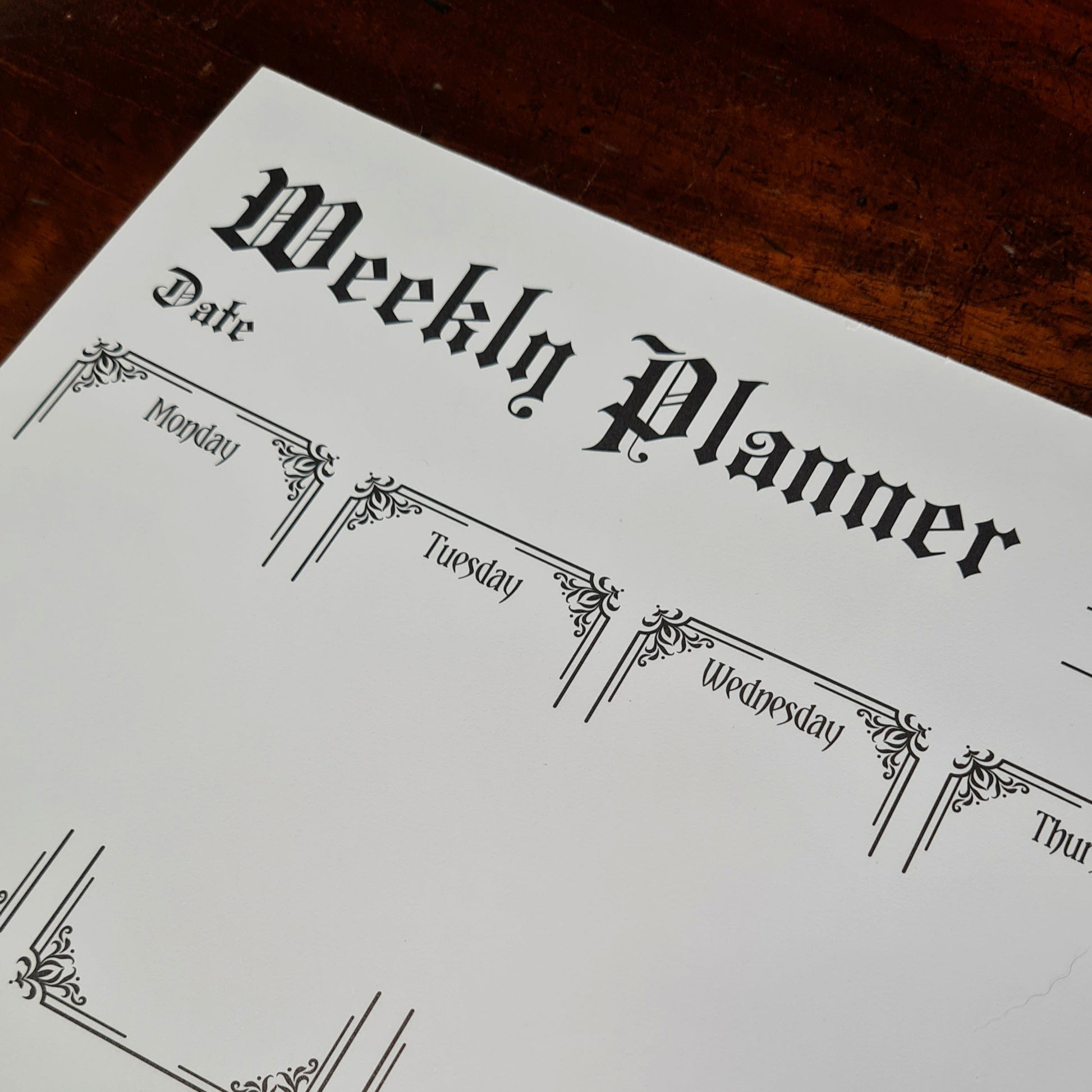 A Weekly Planner Notepad in a Gothic Style. 50 pages with spaces for each day of the week, Notes and Priorities. Product by Gothic Office.